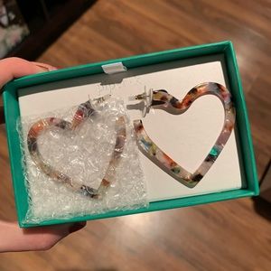 Piper K Heart Shaped Hoop Earrings